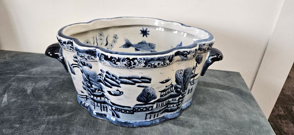 Lot 443: Oriental blue and white porcelain foot bath or...