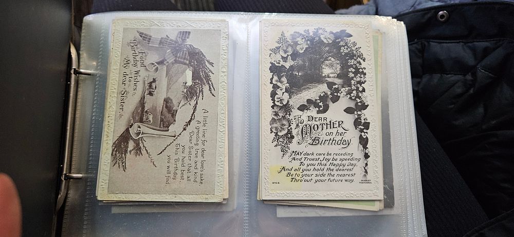 Lot 446: Large folder of assorted antique Edwardian postcards