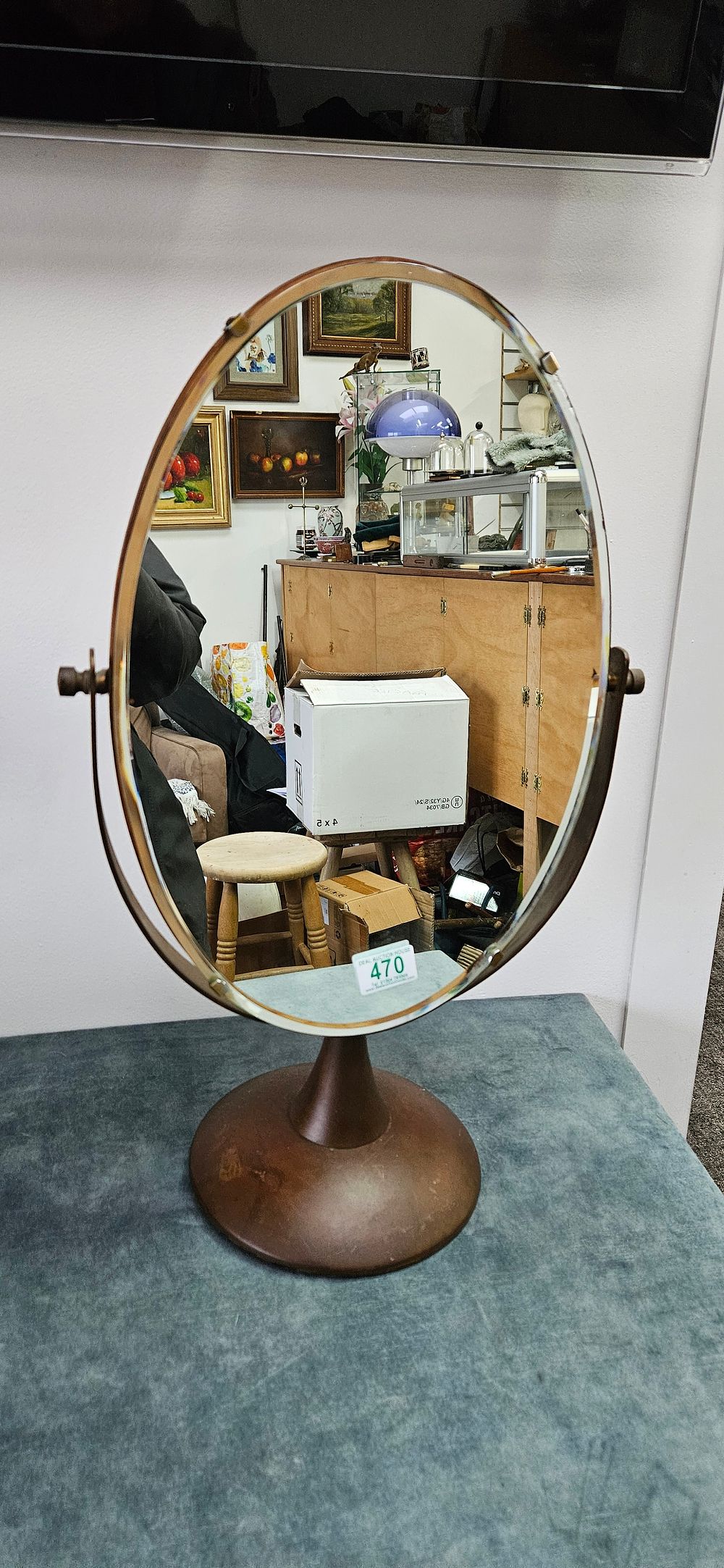 Lot 470: Vintage metal adjustable vanity mirror with an oval...