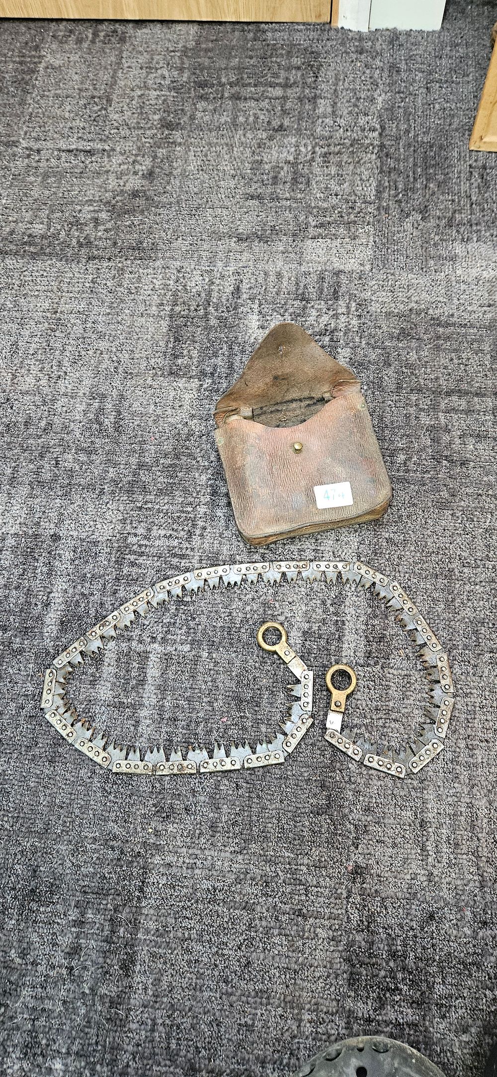 Lot 474: WWI era British military issue chain link folding...