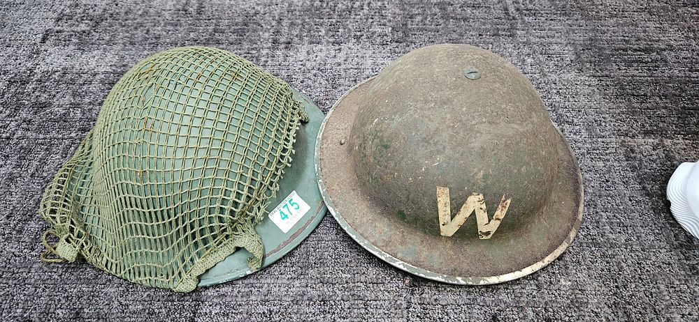 Lot 475: WWII British/ Irish wardens helmet and WWII military...