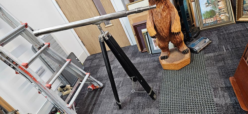 Lot 483: Large modern chrome telescope on tripod
