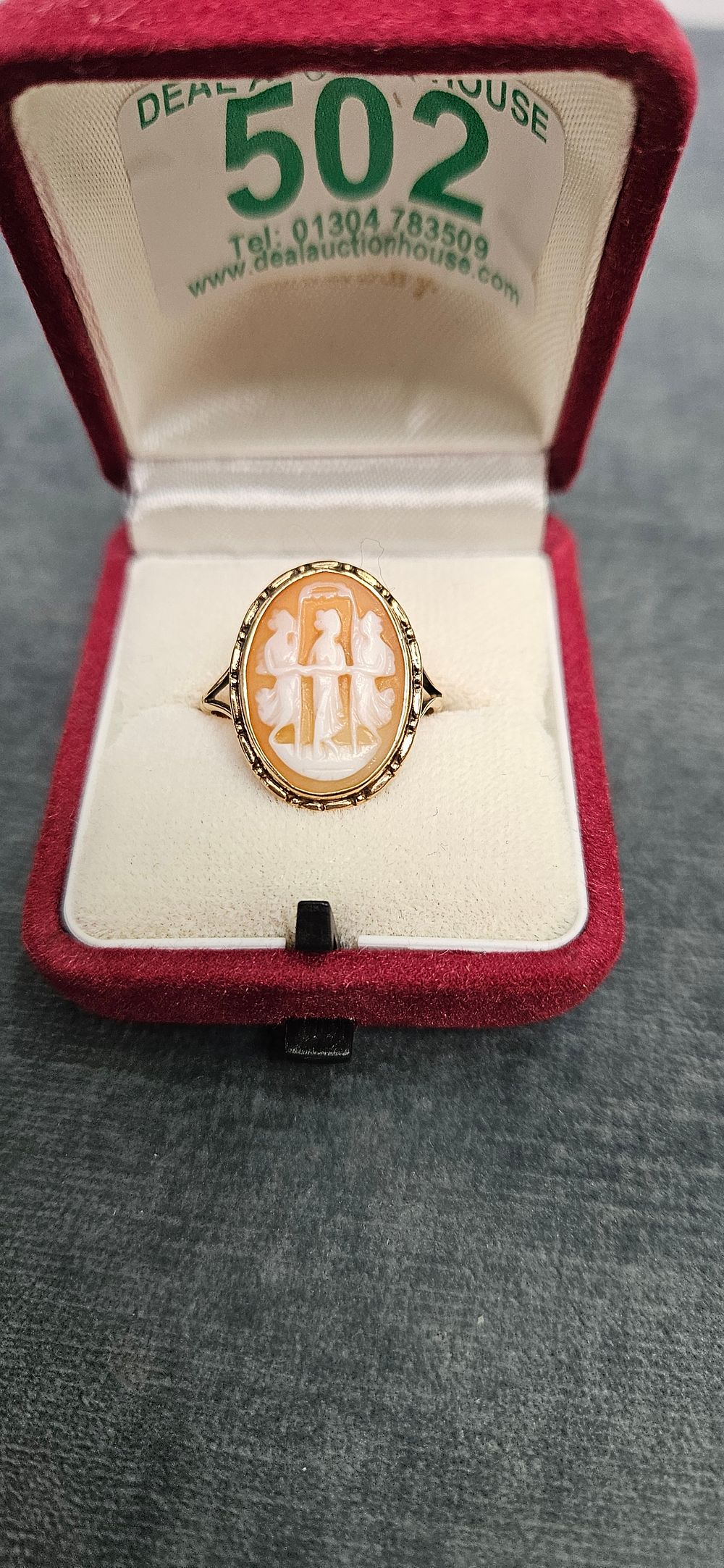 Lot 502: 9ct Yellow gold cameo ring featuring three graces...