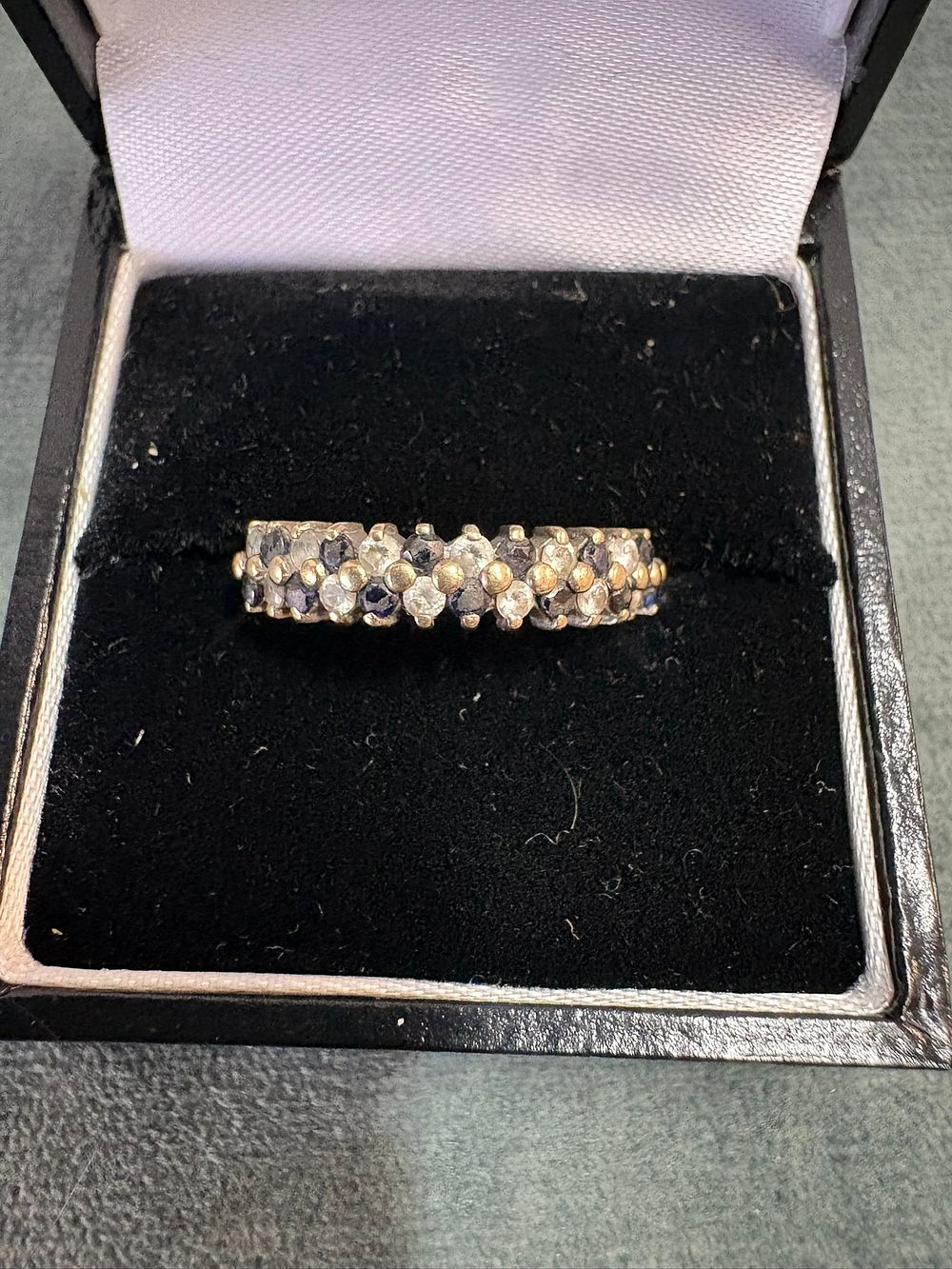 Lot 535: 9ct Yellow gold sapphire and diamond chip ‘zig-zag’...