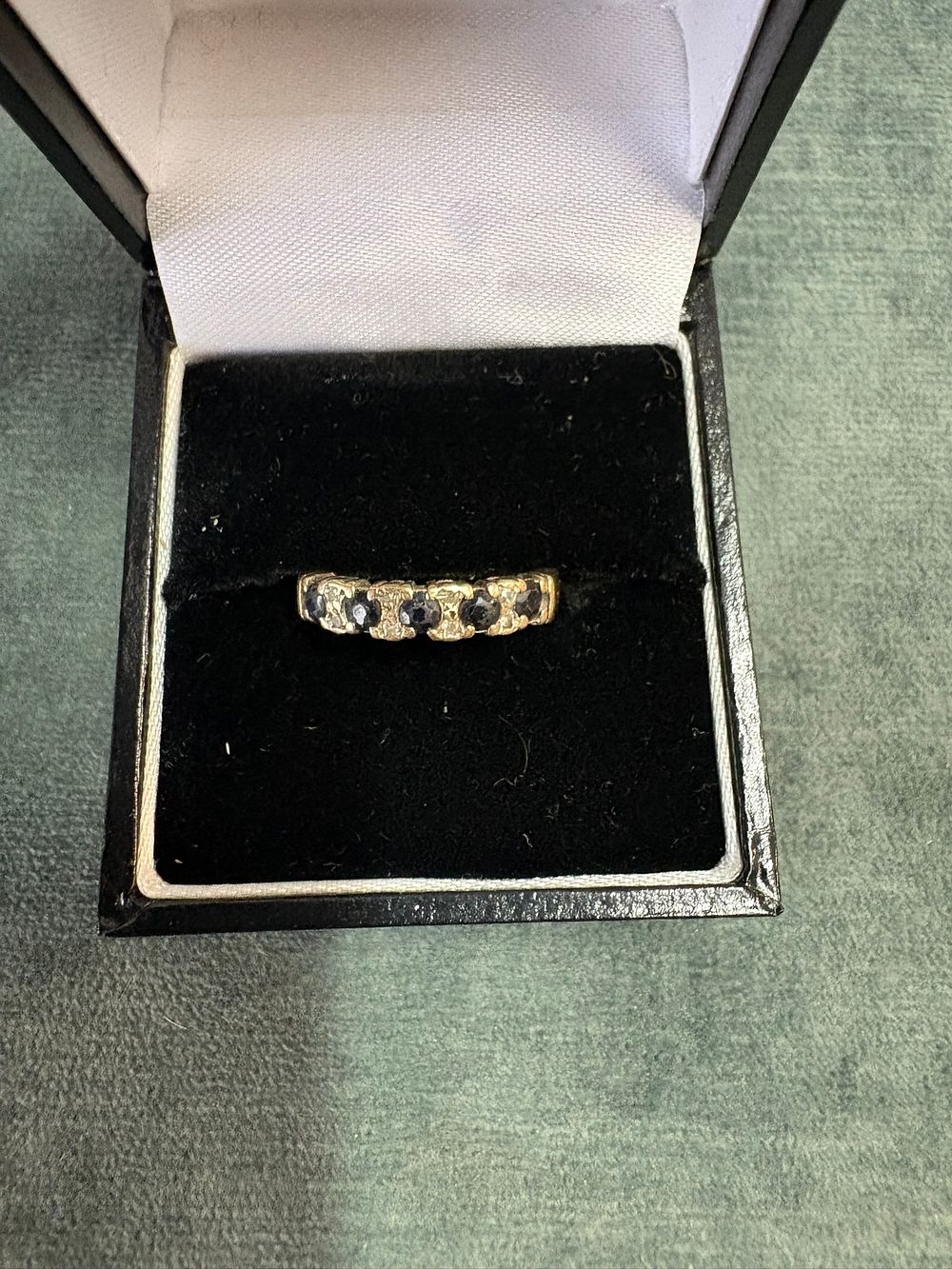 Lot 537: 9ct Yellow gold sapphire and diamond chip ring...