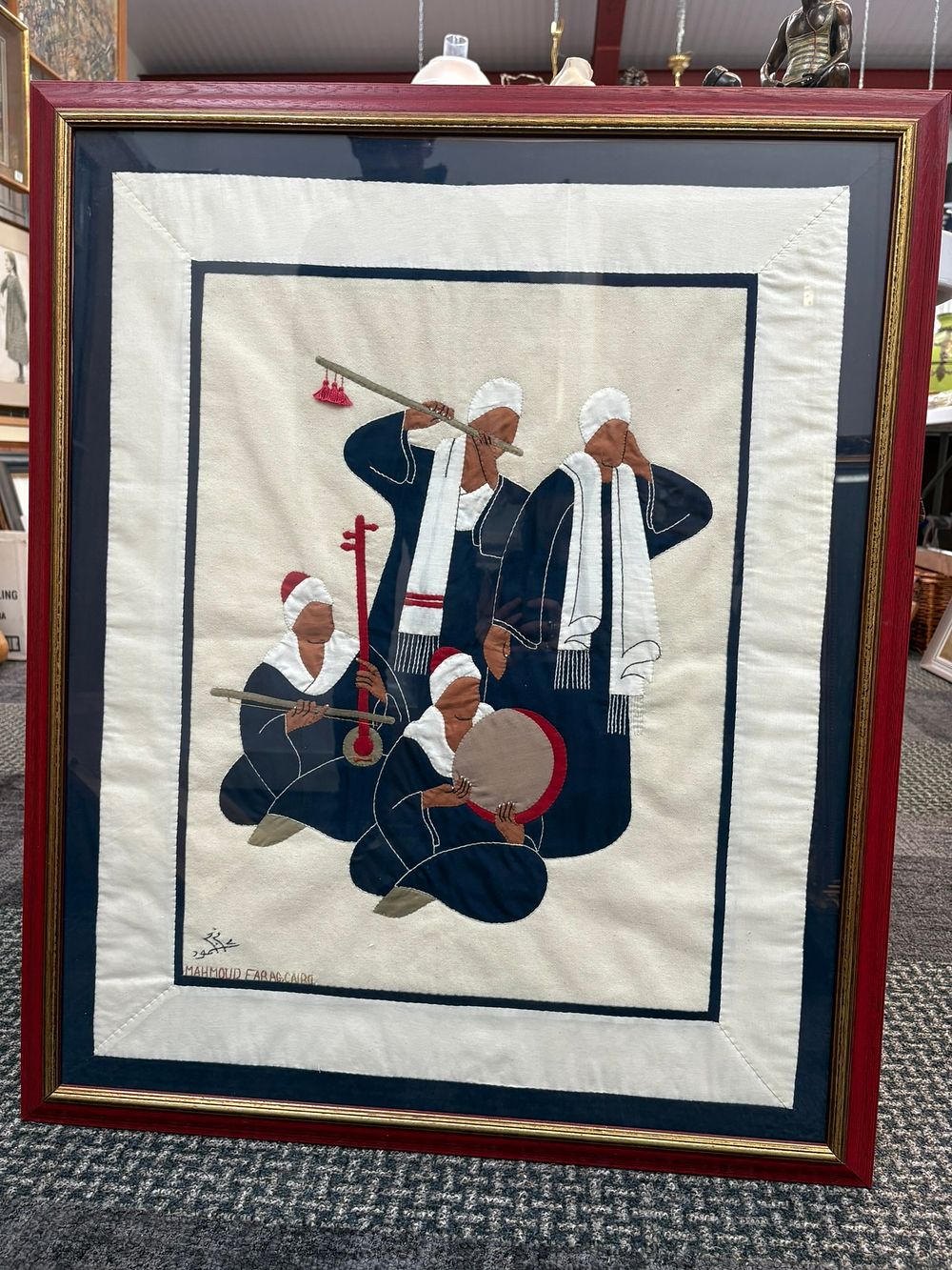 Lot 686: Egyptian framed embroidery/ textile signed Mahmoud Farag Cairo