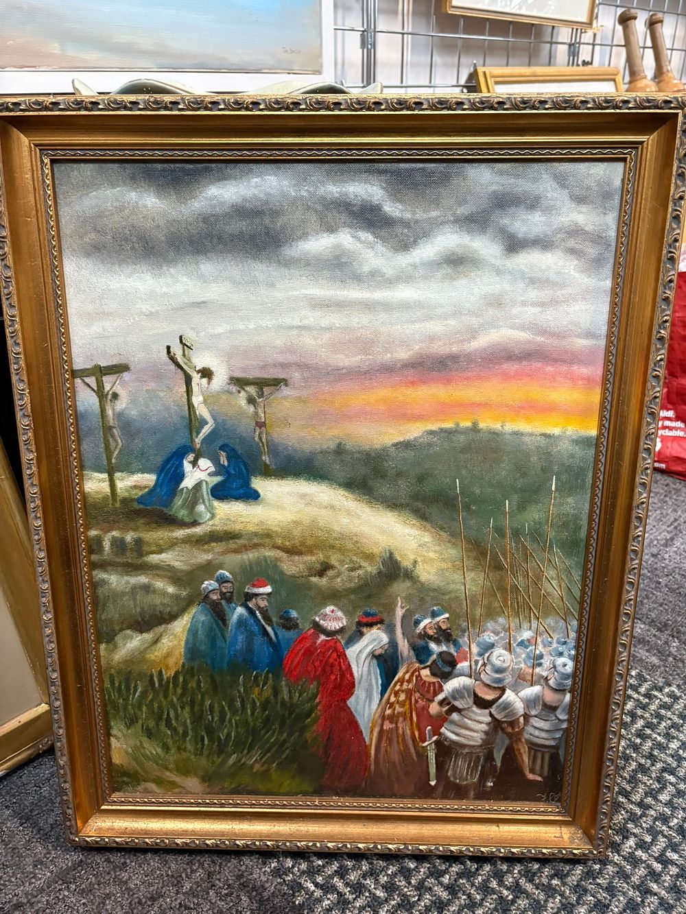 Lot 748: Oil on board of Jesus on the cross