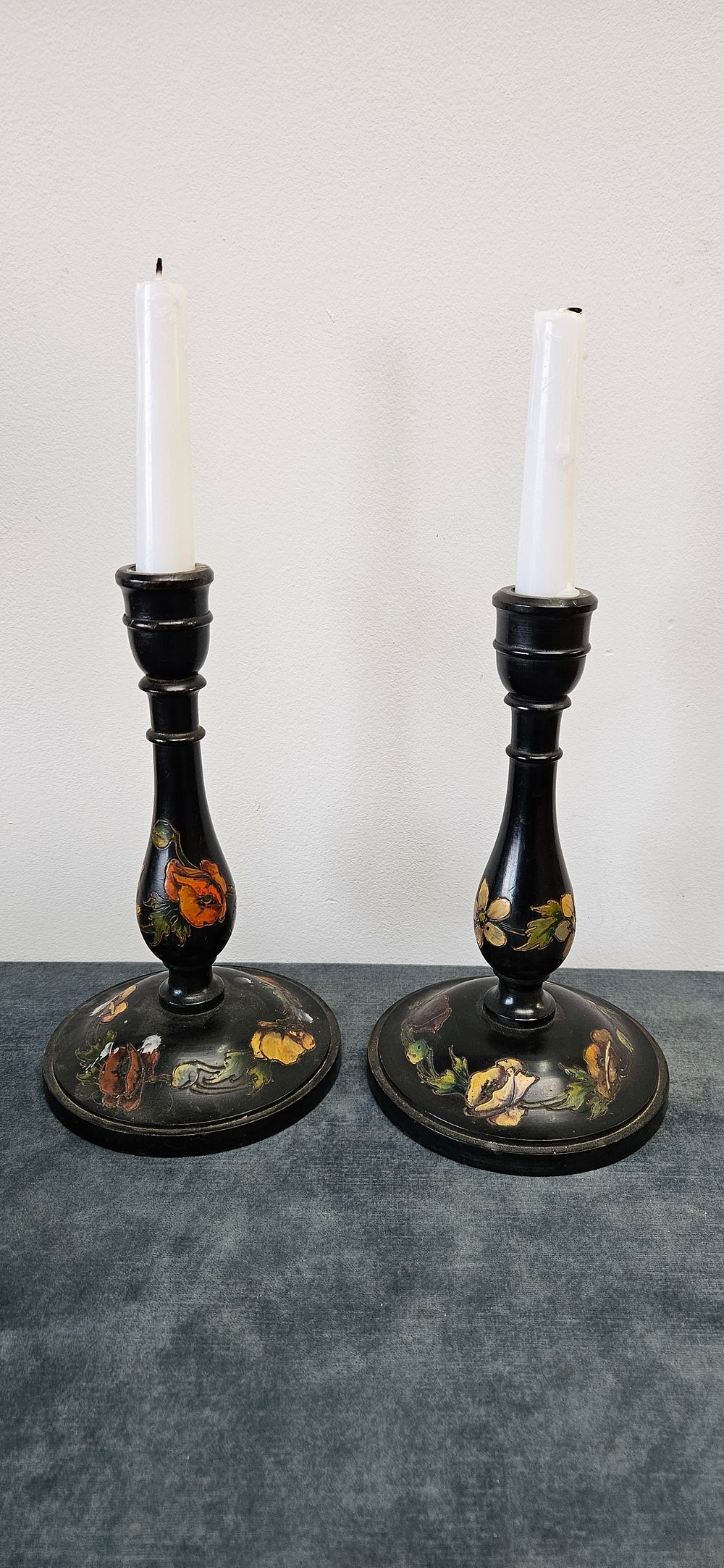 Lot 157: Pair of black lacquer wooden candlesticks decorated with...