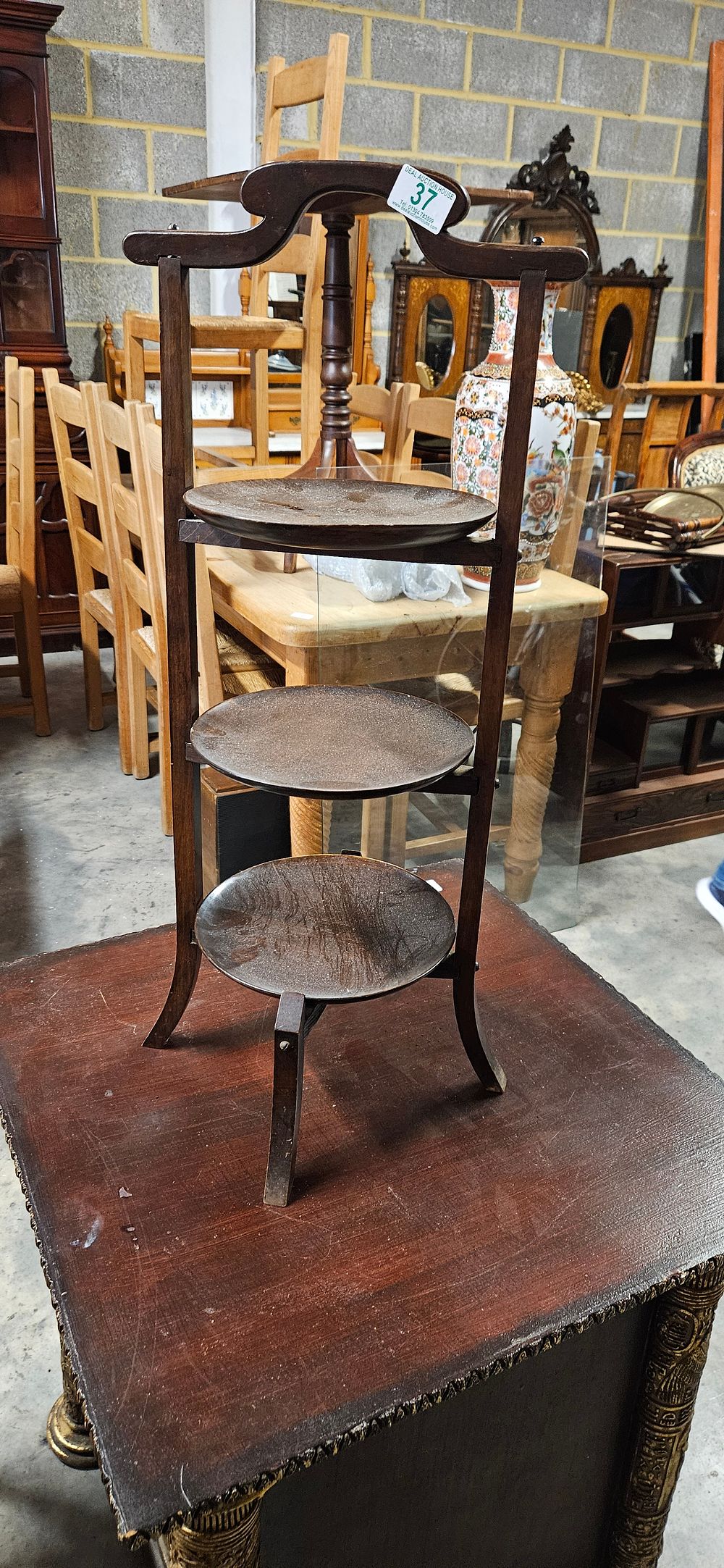 Lot 191: Antique mahogany small cake stand