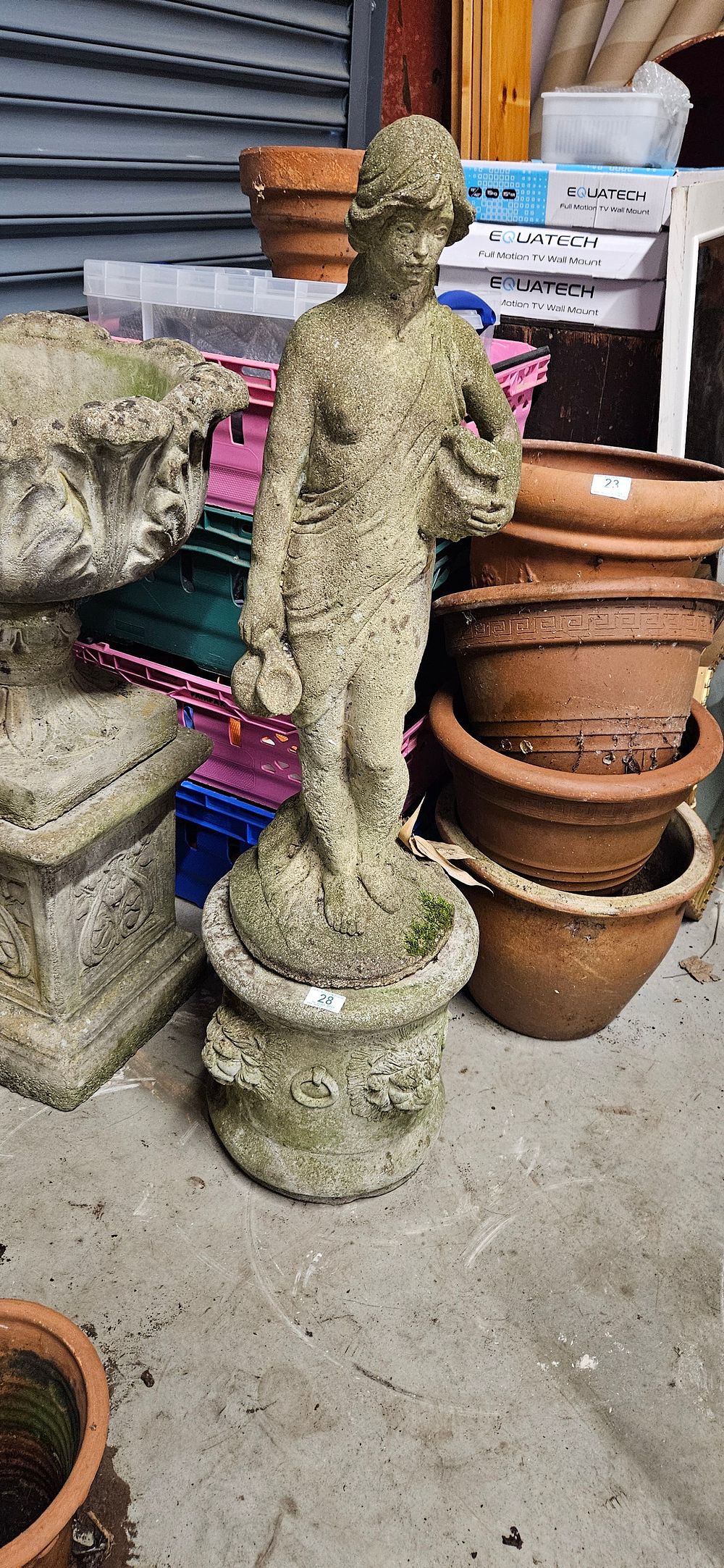 Lot 194: Large concrete garden figure on plinth