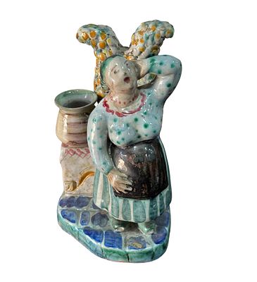 Woman at the well. Glazed ceramic statuette, 20th century, depicting a woman at the well. 