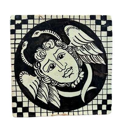 Decorated terracotta tile Medusa. Decorated terracotta tile, 19th/20th century, depicting 