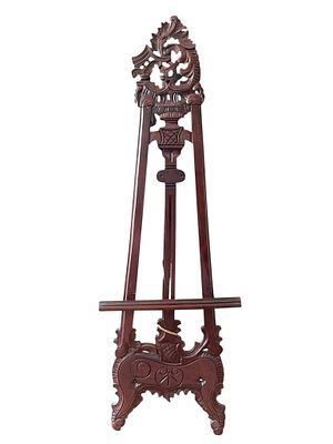 ORNATELY CARVED WOODEN DISPLAY EASEL 63". This is an elegantly hand-carved wooden easel 