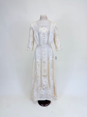 EMBROIDERED CUTWORK & LACE LINGERIE DRESS, c. 1908. B 40", W 21", broad discoloration/staining 