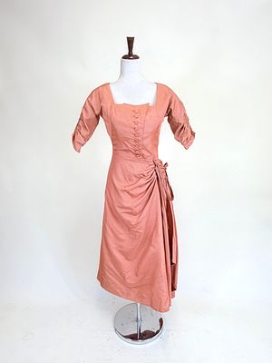 PEACH HONEYCOMB NOVELTY WEAVE PARTY DRESS, LATE 1940s-50s. B 35", W 26", holes at armscye & lap 