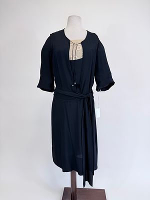 BLACK SILK CREPE & EMBROIDERED AFTERNOON DRESS, 1922. B 39", W 34", w/ original tie belt, damage 