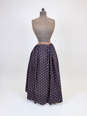 ANTIQUE PRINTED WOOL SKIRT, ORIGINALLY LATE 19TH C. W 28", entirely hand sewn, reworked in late 