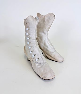 ANTIQUE COTTON SATEEN BUTTON UP BOOTS, 1860s-1870s. Discoloration, some wear to soles, see 