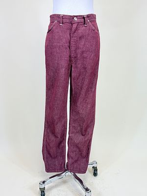 PAIR OF BURGUNDY WRANGLER JEANS, 1960s. W 28", residue at seat, see photos