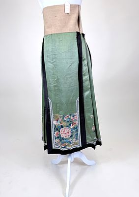 EMBROIDERED PAIRED MANDARIN SKIRT, CHINESE, c. 1890. Waist Wd 45.5", L 40", holes to lining, few 