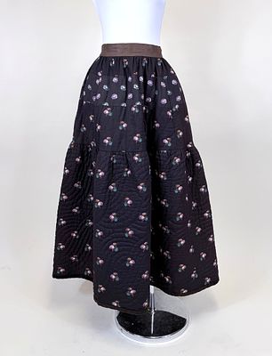 HAND QUILTED PRINTED WOOL WINTER PETTICOAT, MID 19TH C. Entirely hand constructed, W 26", damage 