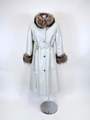 BONNIE CASHIN FUR TRIMMED LEATHER COAT, 1970. CH 36", L 43.5", discoloration at seams, wear to 