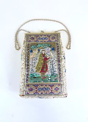 EMBROIDERED DELILL HANDBAG, 1950s. Light stains to lining