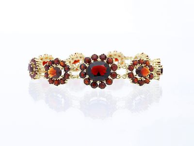 Bracelet 30,00 ct. Garnets 333 Yellow gold 8 kt. Product Description: 
Material: Yellow gold 