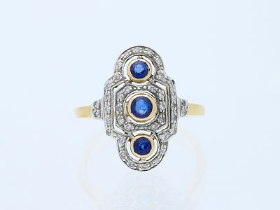 Ring 0,70 ct. Saphir, mehrere Diamanten 750 / 18 Karat. Artikelbeschreibung: 
Material: Gelbgold 