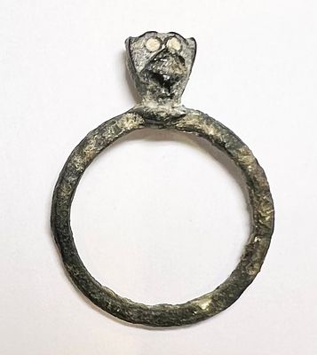 A Bronze Ring with the Head of a Monkey. Roman Period, 2nd - 4th century CE. 22.2 mm high. 19.5 
