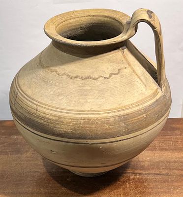 A South Italian Terracotta Jug, ca. 400 BCE. 20.4 cm high with the handle. With linear and wavy 