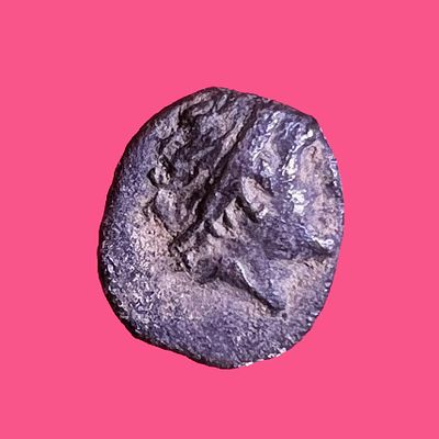 Yehud, 3rd century BCE. Silver hemi-obol, 0.22 gr; 6 mm in diam. Obv: Head of Ptolemy I to r. 