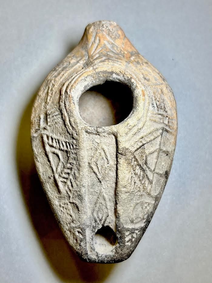 A Samaritan Terracotta Oil Lamp Depicting on Both Sides a Shrine, a Comb and a Trimmer. . 6th - 