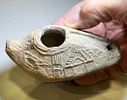A Samaritan Terracotta Oil Lamp Depicting on Both Sides a Shrine, a Comb and a Trimmer. . 6th - Image - 1