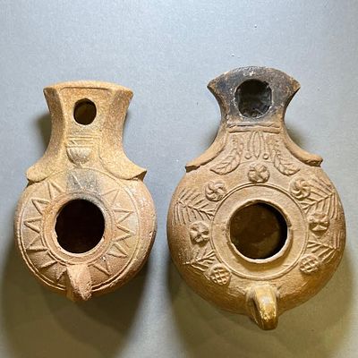 A Lot of 2 Jewish Southern-Type Terracotta Oil Lamps. 1st - 2nd century CE. 10.6 and 9.3 cm. 