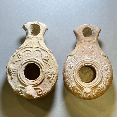 A Lot of 2 Terracotta Oil Lamps. Roman Period, 1st - 2nd century CE. 9.5 and 9.2 cm. Both 