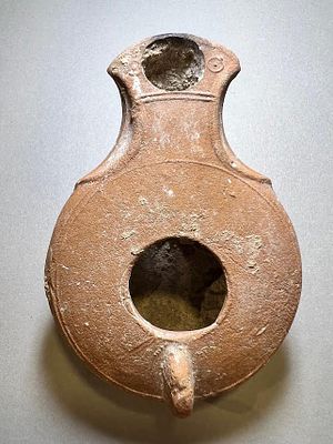 A Jewish Southern-Type Terracotta Oil Lamp. 1st - 2nd century CE. 9.2 cm. In very good 
