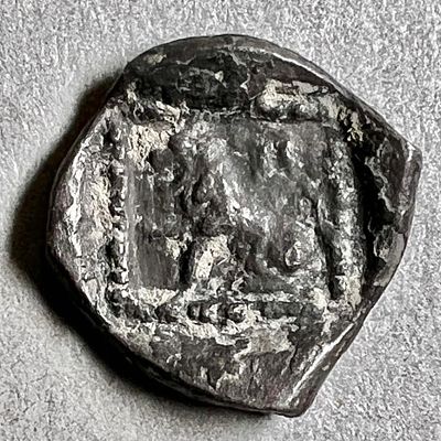 Samaria, 4th century BCE. Silver Obol, 0.57 gr. Obv: Head of Persian King to r. Rev: Seated 