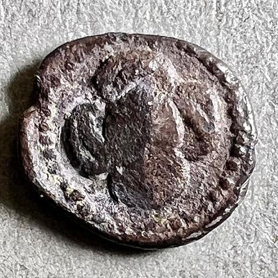 Samaria, 4th century BCE. Silver Hemi-Obol, 0.21 gr. Obv: Bearded Janiform head. Rev: Five 