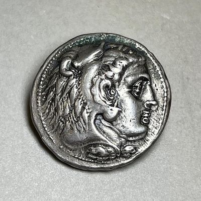 A Silver Tetradrachm of Alexander the Great, 336 - 323 BCE. . 17.14 gr. Obv: Head of Alexander 