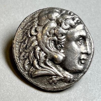 A Silver Tetradrachm of Philipus III - 323 - 317 BCE. . 16.78 gr. Obv: Head of Alexander as 