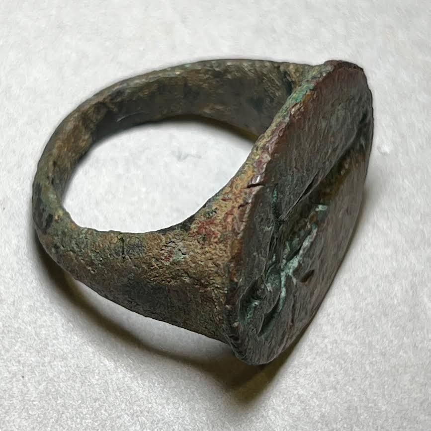 A Hellenistic Bronze Ring Depicting a Deity Holding a Horn of Plenty. 4th - 3rd century BCE. 