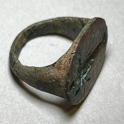 A Hellenistic Bronze Ring Depicting a Deity Holding a Horn of Plenty. 4th - 3rd century BCE. 