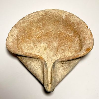 A Terracotta Oil Lamp. Iron Age, ca 1000 BCE. 20.5 cm in diam. With two mini rim chips. In very 