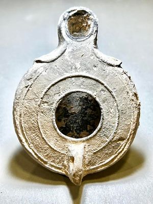 A Jewish Southern Type Terracotta Oil Lamp. 1st - 2nd century CE. 9.2 cm. In very good 