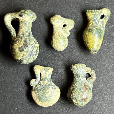 A Lot of 5 Bronze Pendants in the form of Mini Juglets. 1st millennium BCE. 23.1 - 15.9 mm 