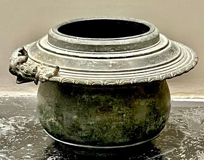 A Cast Bronze Water-Pouring Vessel with Elephant Head Spout. . Far-East 1st cent. CE or later. 