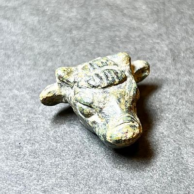 A Zoomorphic Two Shekels Bronze Weight in the Form of a Calf's Head. 14th - 12th century BCE. 