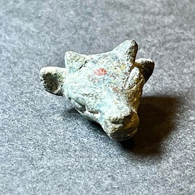 A Zoomorphic Two Shekels Bronze Weight in the Form of a Calf's Head. 14th - 12th century BCE. 