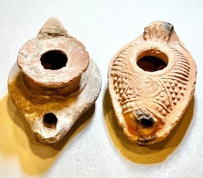 A Lot of 2 Byzantine Terracotta Oil Lamps, 5th - 7th century CE. 9,1 and 8.4 cm. In very good 